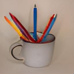 a cup used as a pencil holder