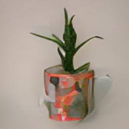 a cup used as a plant pot in studio