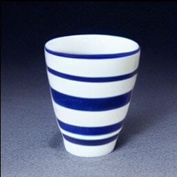 a blue and white striped cup