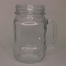 A mason jar cup with a handle facing right 
                            A translucent cup made from glass 
                            An empty cup in studio