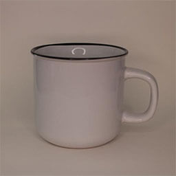 A cylindric camping cup with a handle facing right 
                            A white cup with a black rim 
                            An empty cup in studio