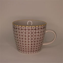 A softly rounded cup with a handle facing right 
                            A beige cup with a brown square and dots pattern and a yellow rim 
                            An empty cup in studio