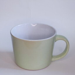 Plain clear sage green empty cylindric cup handle right