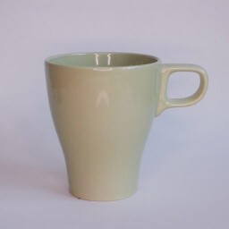 Plain clear empty conic sage green cup handle right