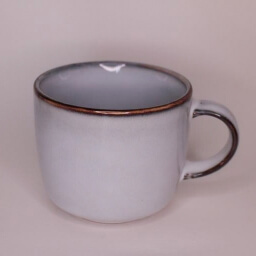 Scandinavian empty cylindric light blue brown rim stone glazed cup handle right