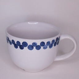 Vintage empty conic round white blue dots cup handle right